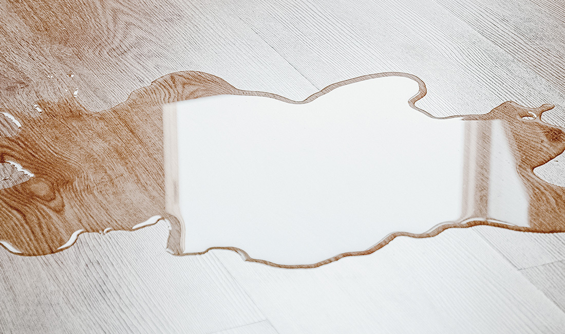Laminate vs. Vinyl Flooring: A Deep Dive into Water Resistance, Claims Rate, and Replacement Economics